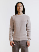 Pull col rond à jeu de points beige