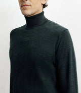 Dark green turtleneck sweater