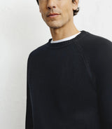 Black round-neck wool sweater
