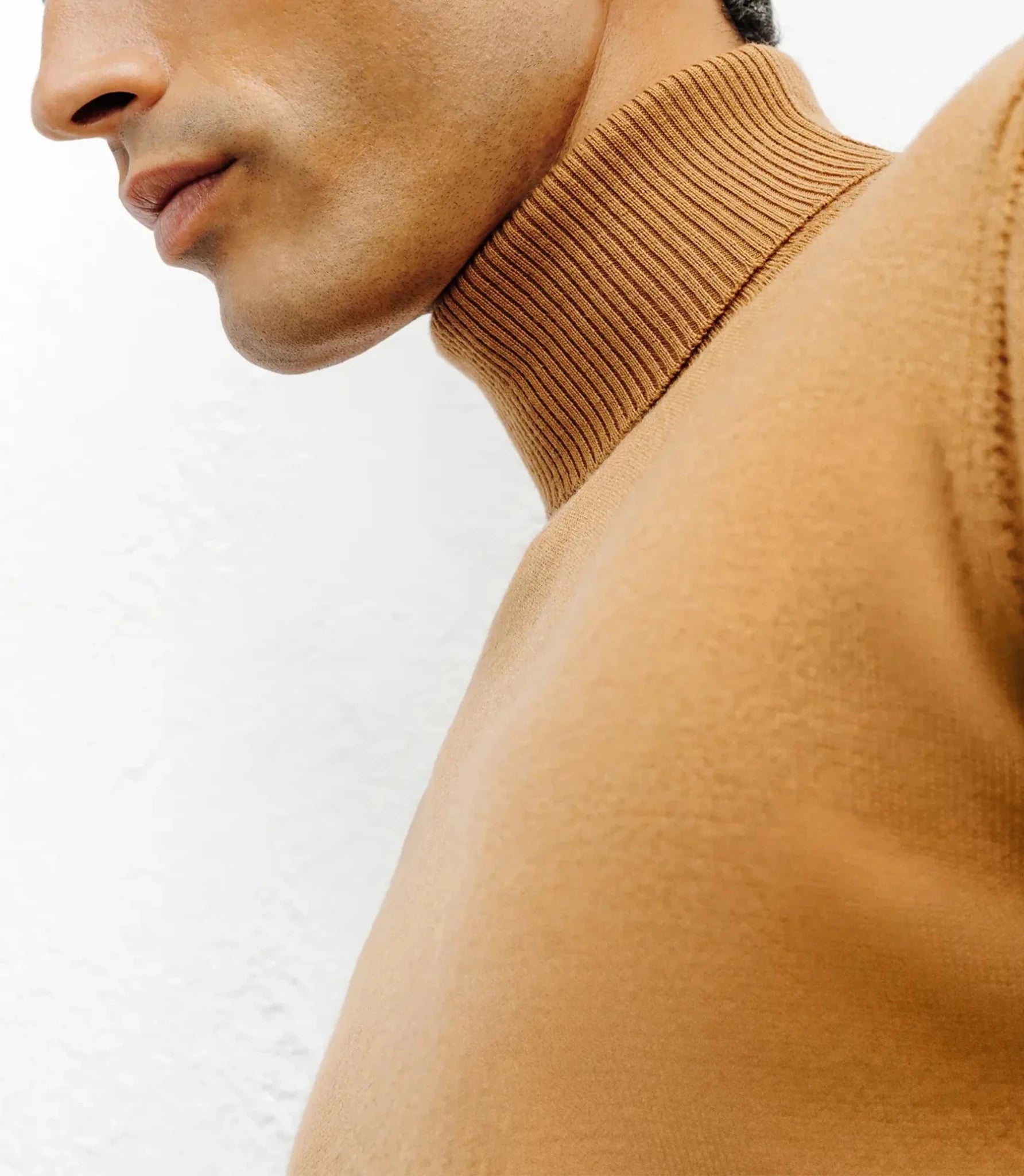 Camel turtleneck sweater