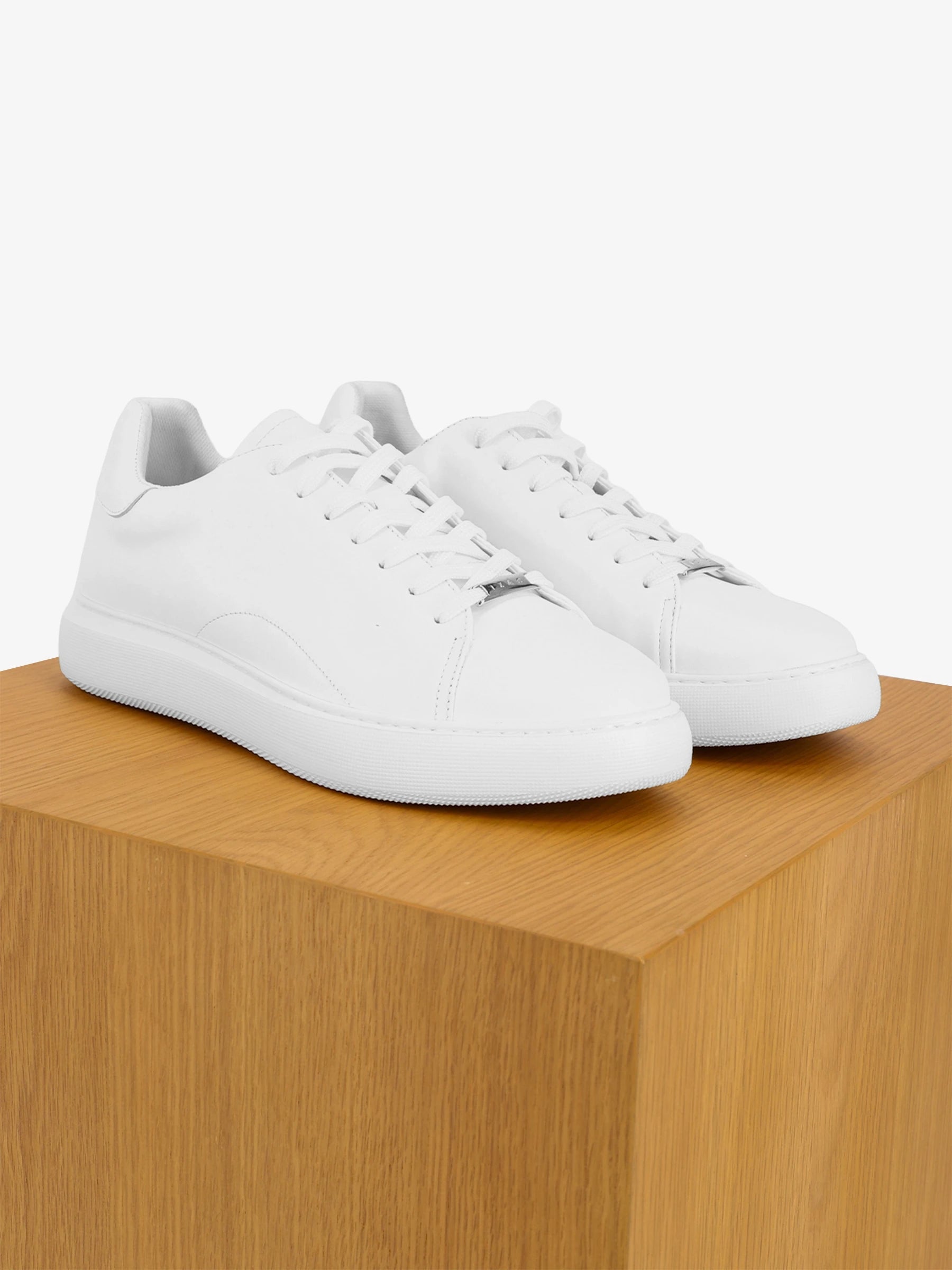 White leather sneakers shoes