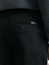 Black velvet trousers